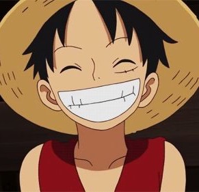 A smiling Monkey D. Luffy wearing his straw hat